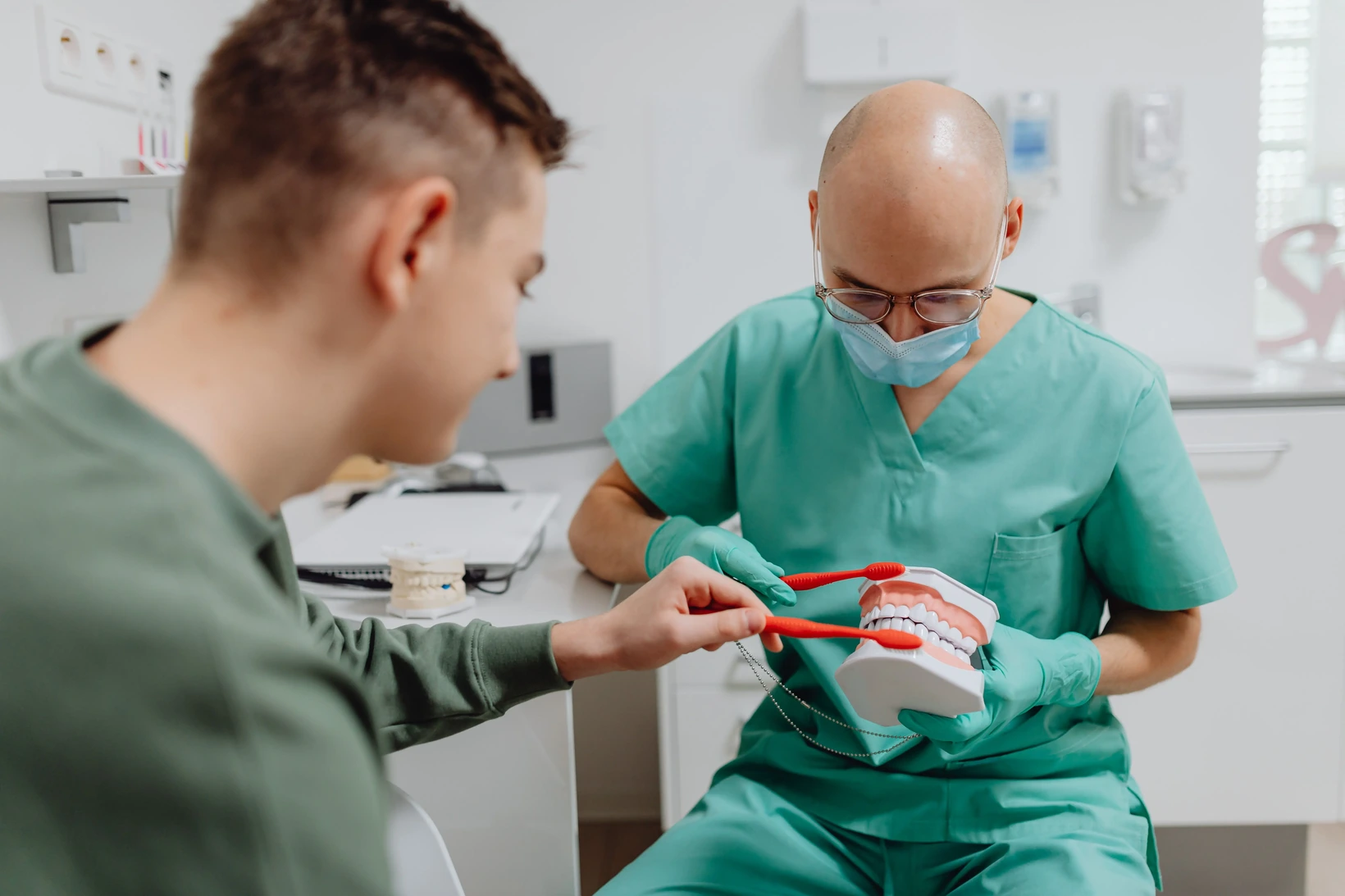 Emergency dentist in Audubon Park, KY treating a dental abscess at an urgent same-day visit