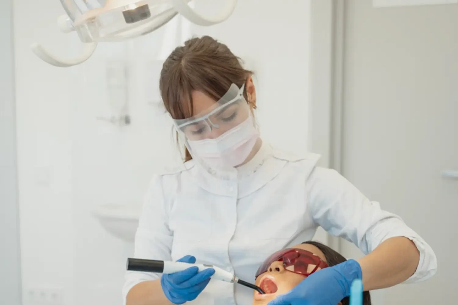 Emergency dentist in Clarksville, IN reviewing X-rays with a patient during walk-in emergency dental care