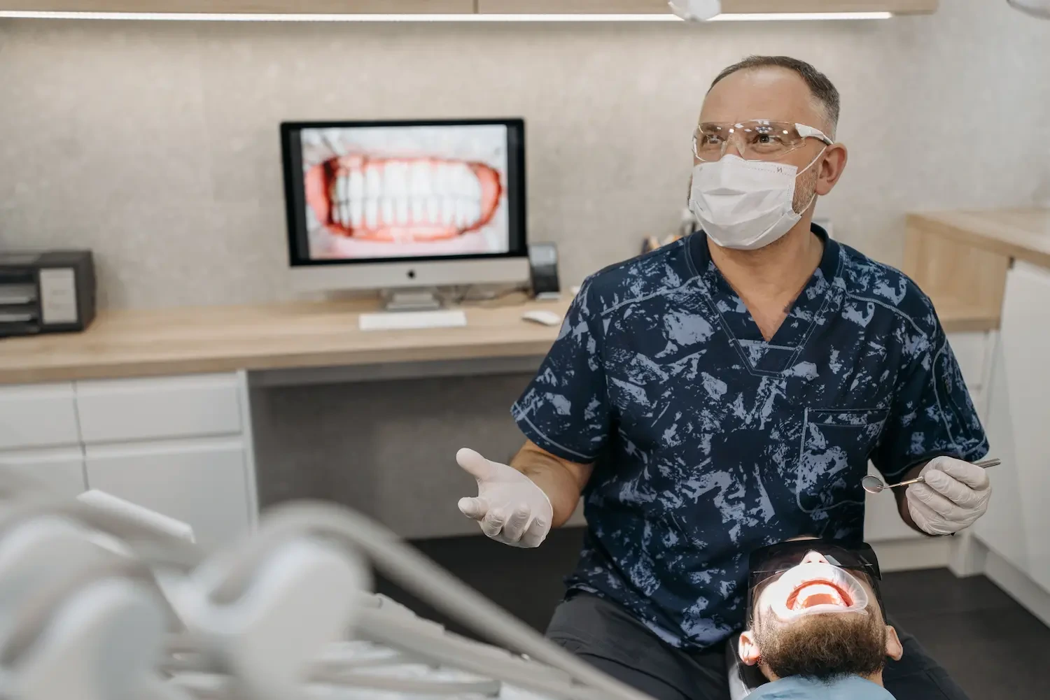 Emergency dentist in Old Louisville, KY carrying out urgent same-day dental treatment