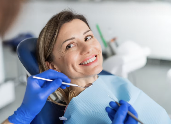 Patient receiving a routine dental exam and cleaning in Louisville, KY